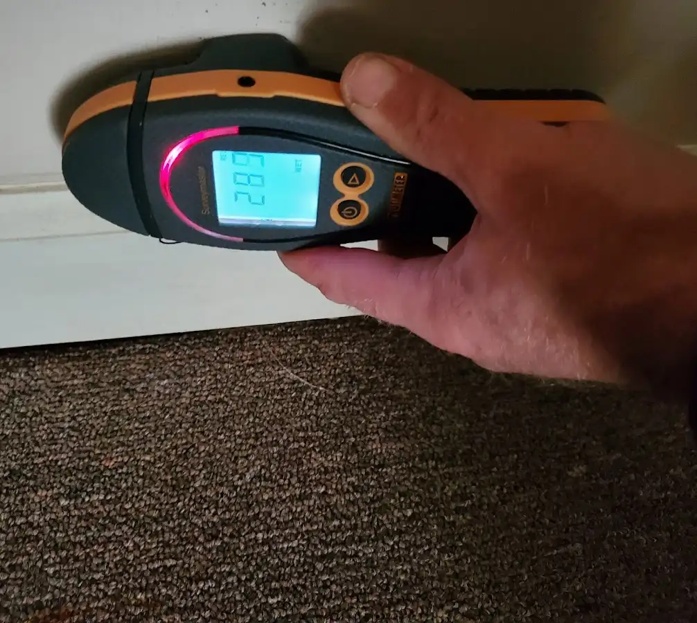 Moisture detection at baseboard during Mold Inspection & Testing in Hialeah